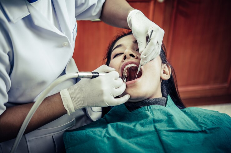 Dentists treat patients' teeth.<br />
